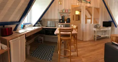 Cuisine ou kitchenette dans l'établissement La maison de l'Odet