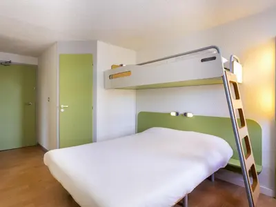 Un ou plusieurs lits dans un hébergement de l'établissement ibis budget Quimper