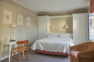 Un ou plusieurs lits dans un hébergement de l'établissement Le Grand Hotel des Bains & Spa - Bretagne