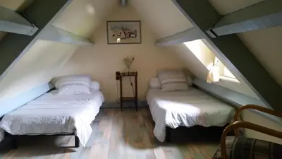 Un ou plusieurs lits dans un hébergement de l'établissement maison kerivarch G