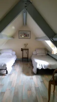 Un ou plusieurs lits dans un hébergement de l'établissement maison kerivarch G