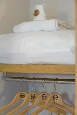 Un ou plusieurs lits dans un hébergement de l'établissement B&B HOTEL Morlaix