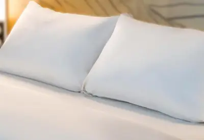 Un ou plusieurs lits dans un hébergement de l'établissement B&B HOTEL Morlaix