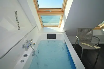 Salle de bains dans l'établissement Villa de la plage de Plouescat