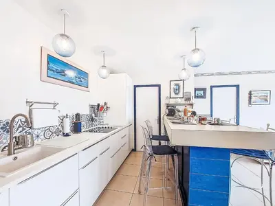 Cuisine ou kitchenette dans l'établissement Holiday Home TY Greg by Interhome