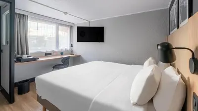 Télévision ou salle de divertissement dans l'établissement Campanile Brest - Gouesnou Aeroport