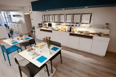 Cuisine ou kitchenette dans l'établissement Hôtel Du Port