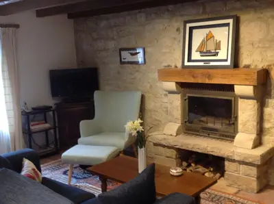 Télévision ou salle de divertissement dans l'établissement Brittany Vacation Rental