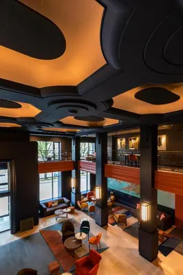 Coin salon dans l'établissement Hôtel & Spa Oceania Le Conti