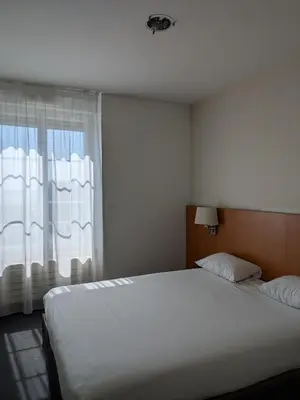 Un ou plusieurs lits dans un hébergement de l'établissement Hotel de la Gare Brest