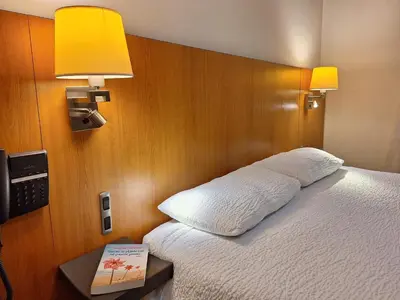 Un ou plusieurs lits dans un hébergement de l'établissement Hotel de la Gare Brest
