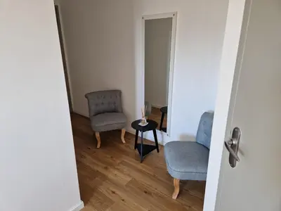 Coin salon dans l'établissement Kyriad Quimper Sud