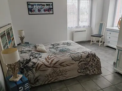 Un ou plusieurs lits dans un hébergement de l'établissement La maison rouge