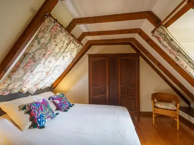 Un ou plusieurs lits dans un hébergement de l'établissement Holiday Home Chez Jeanne by Interhome