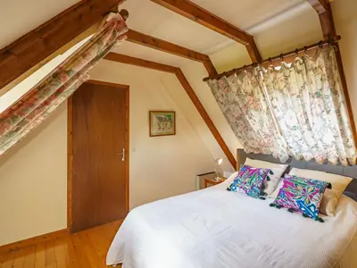 Un ou plusieurs lits dans un hébergement de l'établissement Holiday Home Chez Jeanne by Interhome