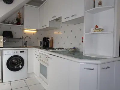 Cuisine ou kitchenette dans l'établissement Apartment Camélia by Interhome