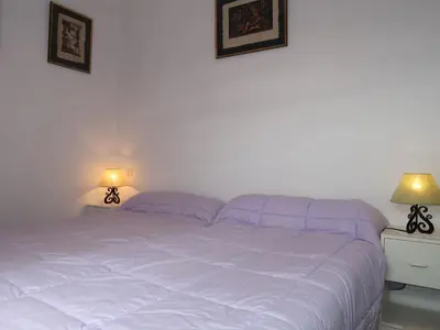 Un ou plusieurs lits dans un hébergement de l'établissement Apartment Camélia by Interhome