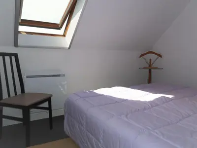 Un ou plusieurs lits dans un hébergement de l'établissement Apartment Camélia by Interhome