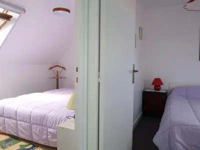 Un ou plusieurs lits dans un hébergement de l'établissement Apartment Camélia by Interhome