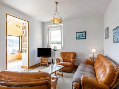 Télévision ou salle de divertissement dans l'établissement Holiday Home Ti an Aod by Interhome