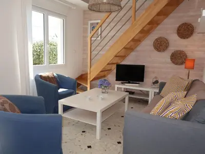 Télévision ou salle de divertissement dans l'établissement Holiday Home Rendez-vous à la plage by Interhome