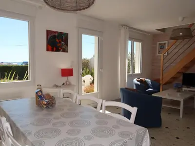 Coin salon dans l'établissement Holiday Home Rendez-vous à la plage by Interhome