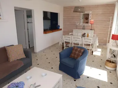 Coin salon dans l'établissement Holiday Home Rendez-vous à la plage by Interhome