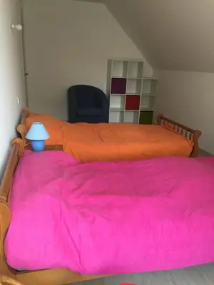 Un ou plusieurs lits dans un hébergement de l'établissement Villa Benodet