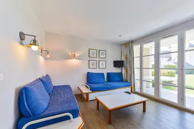 Coin salon dans l'établissement Residence Cap Glenan - maeva Home