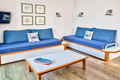Coin salon dans l'établissement Residence Cap Glenan - maeva Home