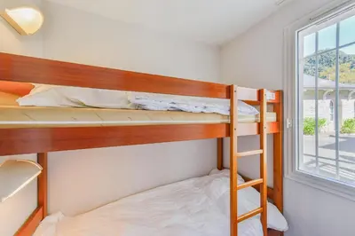 Un ou plusieurs lits dans un hébergement de l'établissement Residence Cap Glenan - maeva Home