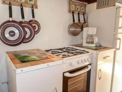 Cuisine ou kitchenette dans l'établissement Holiday Home La Bergerie by Interhome