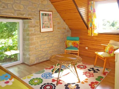 Coin salon dans l'établissement Holiday Home La Ferme Bis by Interhome