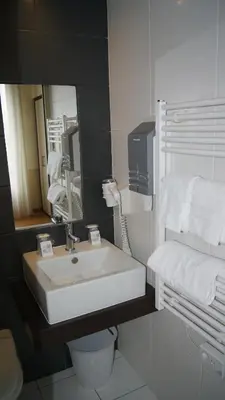 Salle de bains dans l'établissement Hotel De La Rade