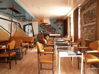 Coin salon dans l'établissement Hôtel Modern