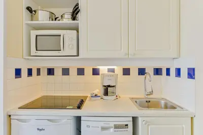 Cuisine ou kitchenette dans l'établissement Residence Cap Marine - maeva Home