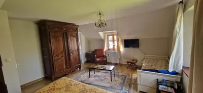 Télévision ou salle de divertissement dans l'établissement Auberge De Bel Air