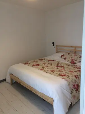 Un ou plusieurs lits dans un hébergement de l'établissement La Maison Bellevue