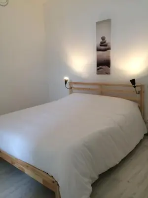 Un ou plusieurs lits dans un hébergement de l'établissement La Maison Bellevue