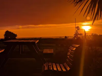 Lever ou coucher de soleil vu de le B&B/chambre d'hôtes ou à proximité