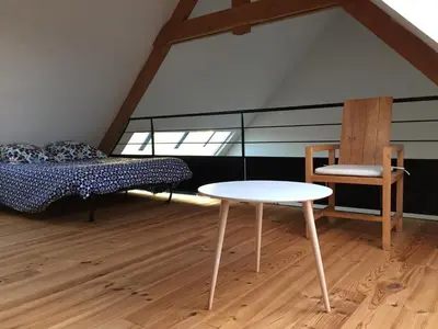 Coin salon dans l'établissement Maison près des plages