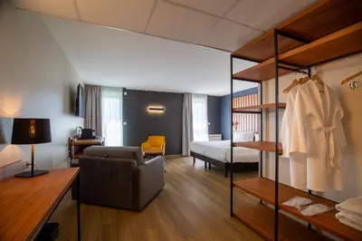 Un ou plusieurs lits dans un hébergement de l'établissement Best Western Côte des Sables Plouescat