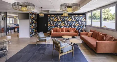 Coin salon dans l'établissement Best Western Côte des Sables Plouescat