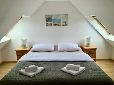 Un ou plusieurs lits dans un hébergement de l'établissement Lescoat-le petit paradis