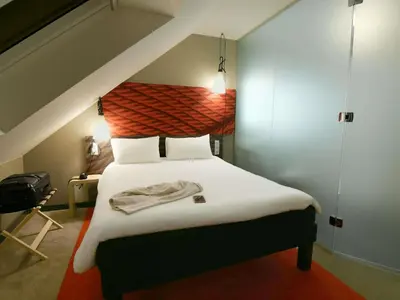 Un ou plusieurs lits dans un hébergement de l'établissement ibis Brest Kergaradec