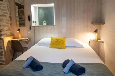 Un ou plusieurs lits dans un hébergement de l'établissement Hotel D'Angleterre