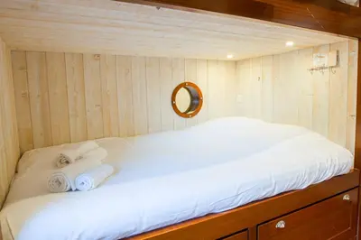 Un ou plusieurs lits dans un hébergement de l'établissement Appartement sainte marine vue mer