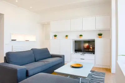 Coin salon dans l'établissement Appartement sainte marine vue mer