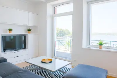 Coin salon dans l'établissement Appartement sainte marine vue mer
