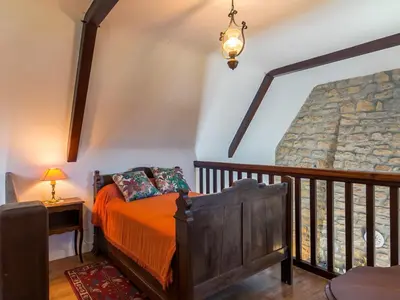Un ou plusieurs lits dans un hébergement de l'établissement Holiday Home Blaue Hortensie by Interhome